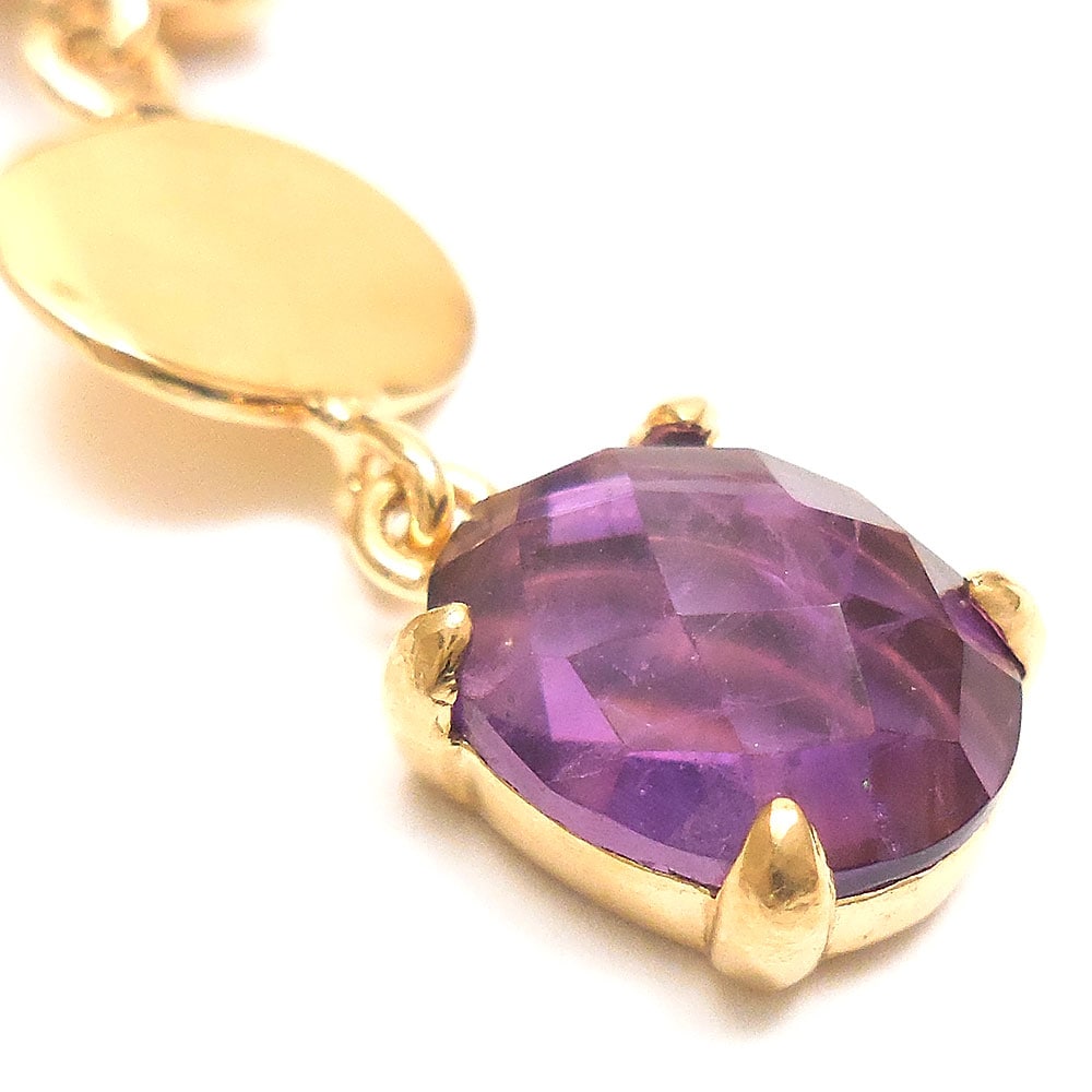 2つの石が揺れるダングル・ペンダント